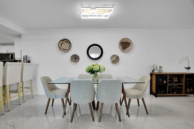 view of tiled dining space