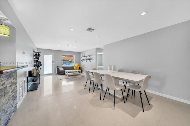 dining room with light tile patterned floors