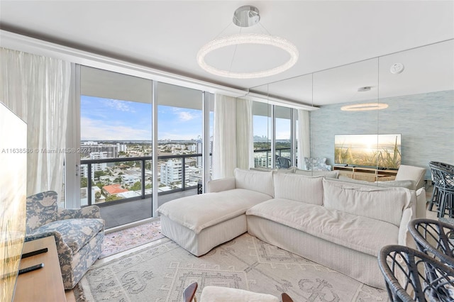 living area featuring a wall of windows