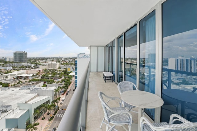 balcony featuring a view of city