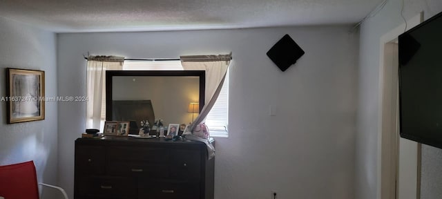 bedroom with a textured ceiling