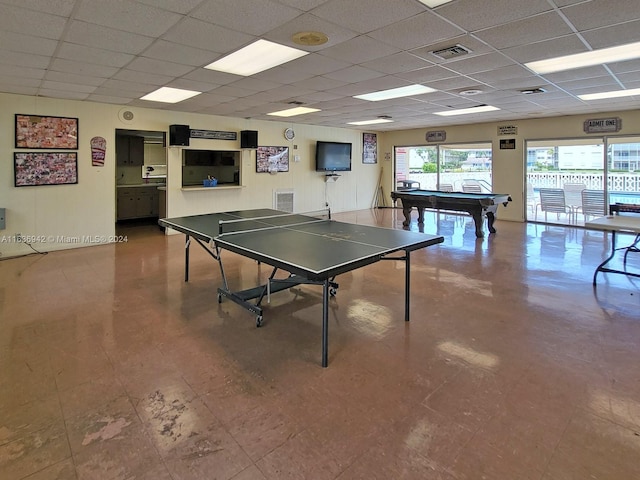 playroom featuring pool table, a paneled ceiling, and tile patterned floors