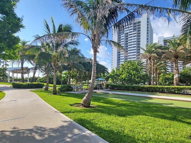 1825 S Ocean Dr Unit 206, Hallandale Beach, FL 33009 - view of community with a yard and a bocce ball area