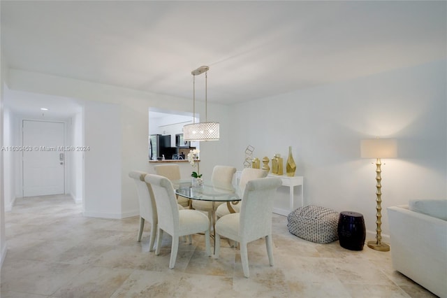 view of tiled dining space