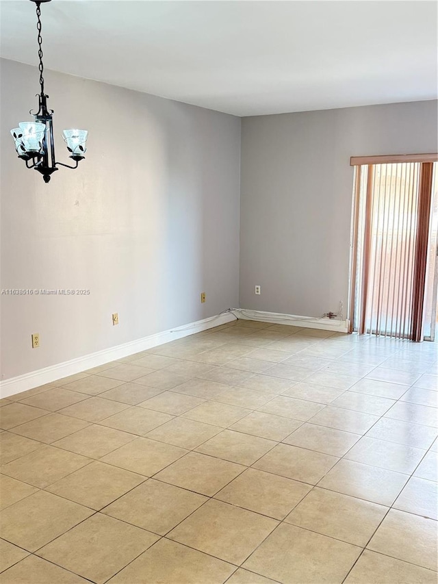 440 E 23rd St Unit 1219, Hialeah, FL 33013 - unfurnished room featuring a chandelier, baseboards, and light tile patterned floors