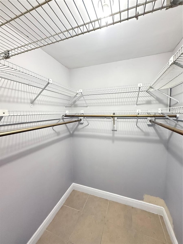 440 E 23rd St Unit 1219, Hialeah, FL 33013 - walk in closet featuring light tile patterned floors