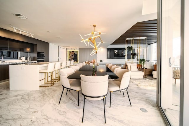 dining room featuring a notable chandelier