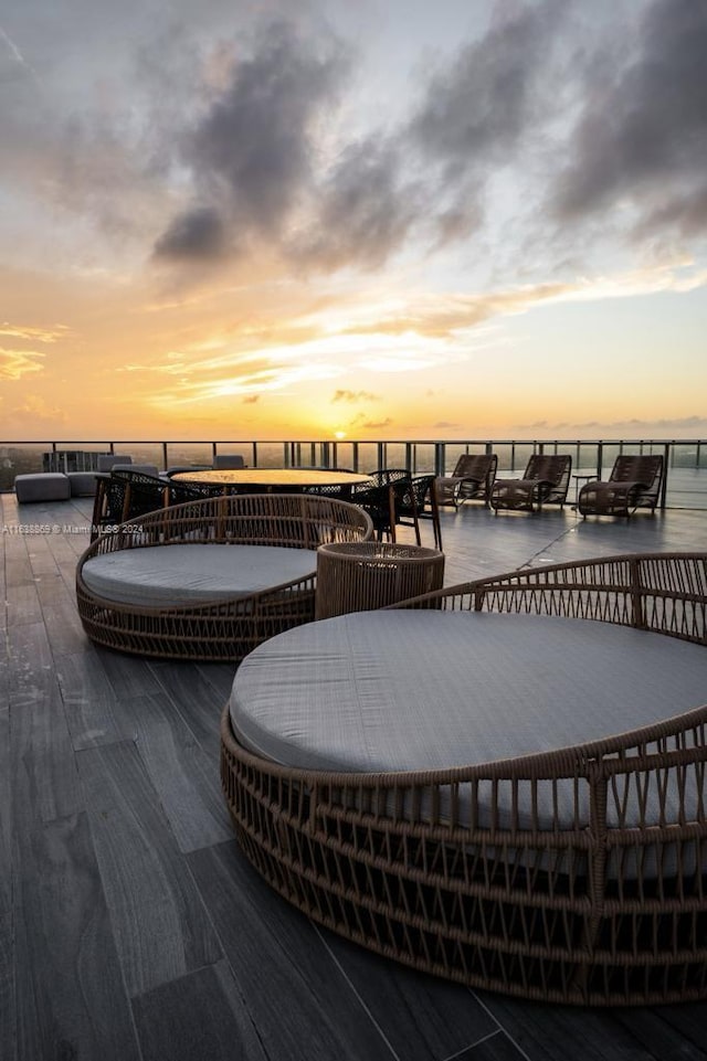 851 NE 1st Ave Unit 4811, Miami, FL 33132 - patio terrace at dusk featuring a water view and a balcony