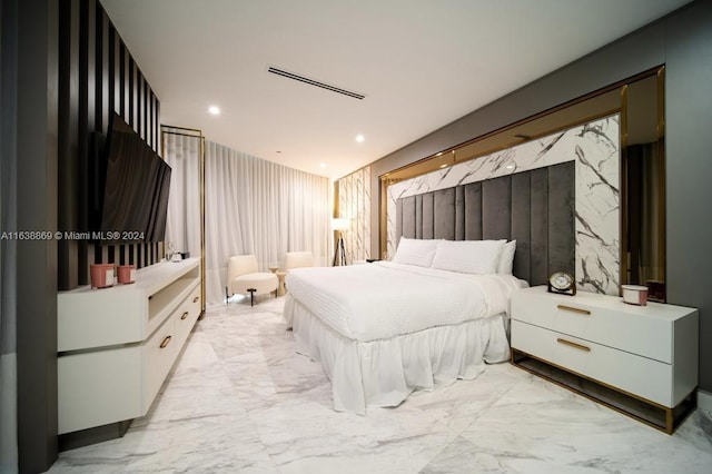851 NE 1st Ave Unit 4811, Miami, FL 33132 - bedroom featuring light marble finish floors and recessed lighting
