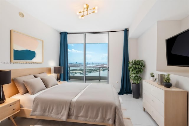 tiled bedroom featuring expansive windows