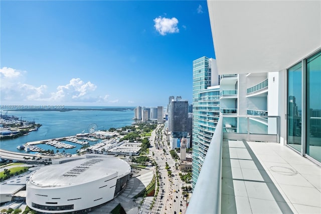 balcony featuring a water view