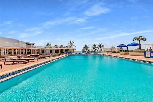 community pool featuring a patio area