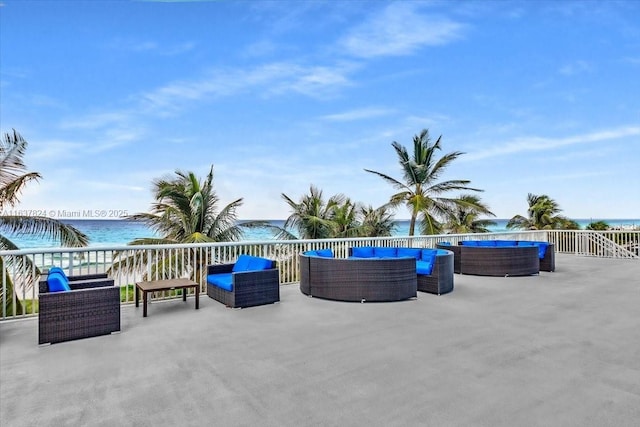 view of patio featuring a water view and an outdoor hangout area