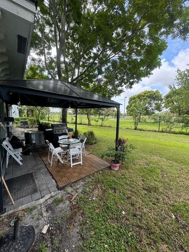 view of yard featuring a patio and a gazebo