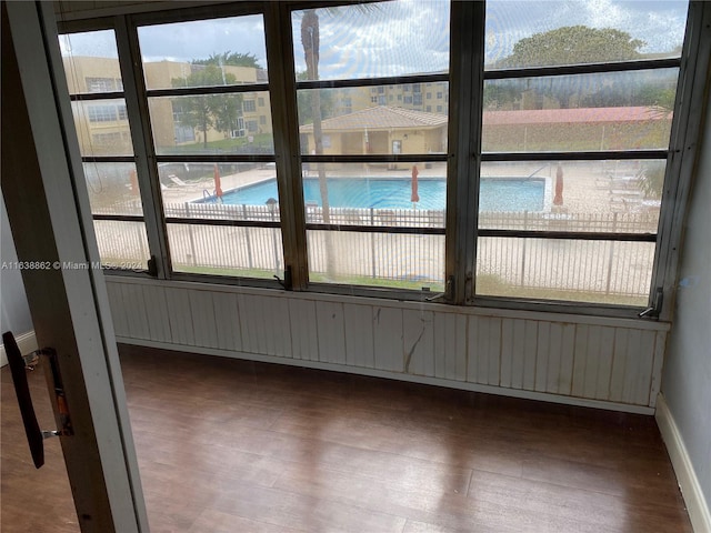 empty room featuring hardwood / wood-style flooring