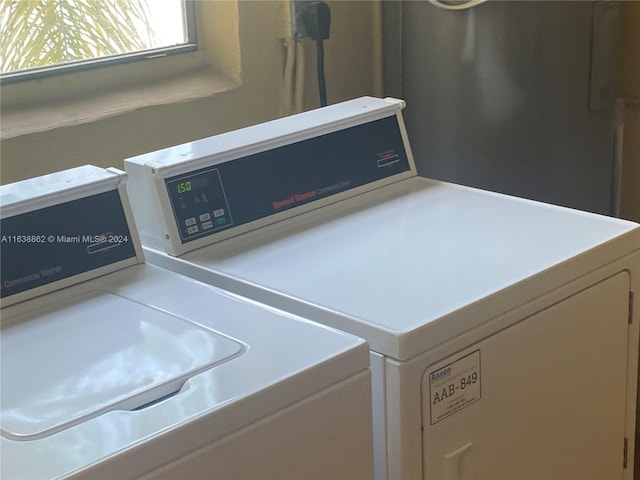 laundry area with washer and clothes dryer