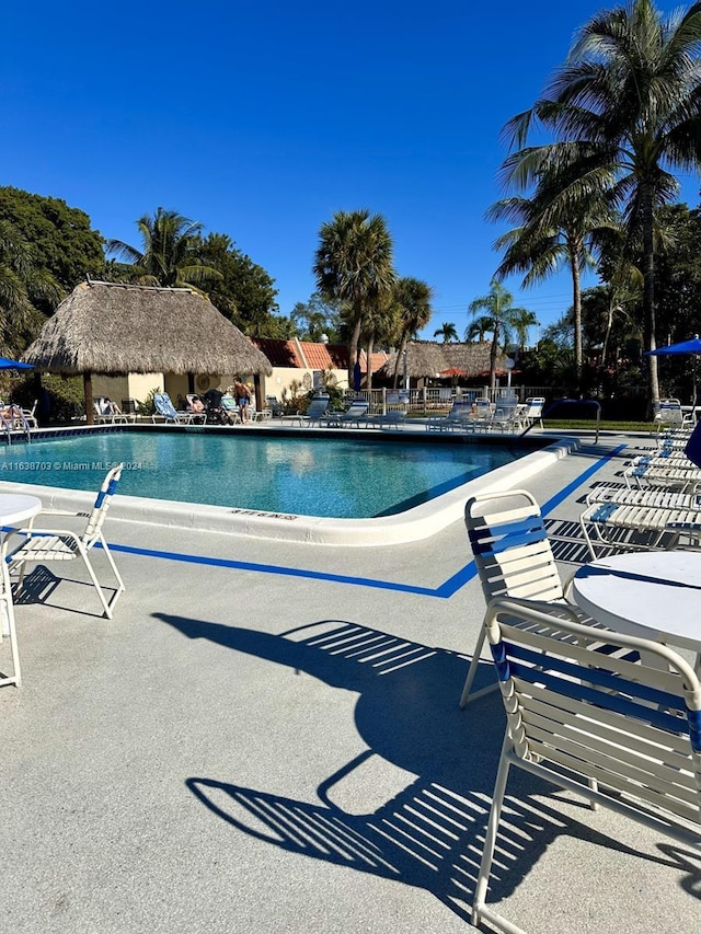 view of swimming pool with a patio area