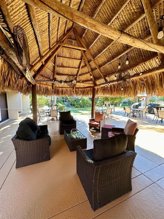 view of patio / terrace with a gazebo and ceiling fan