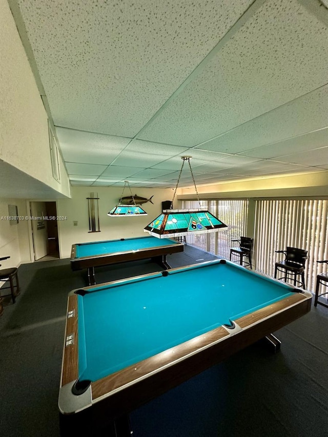 rec room featuring carpet flooring, a drop ceiling, and pool table