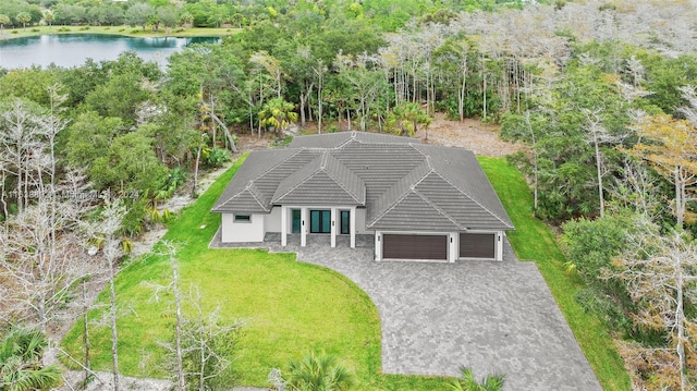 birds eye view of property featuring a water view