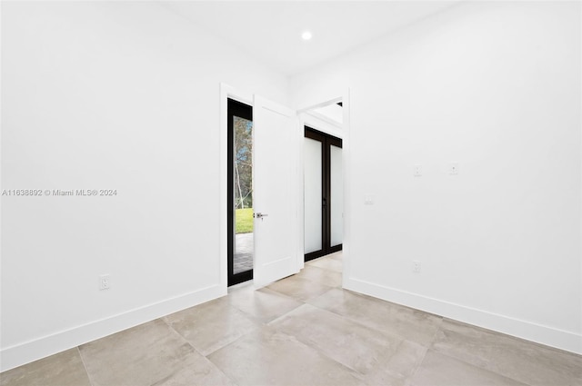 view of tiled spare room