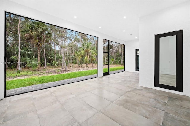 view of tiled spare room