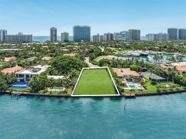 bird's eye view with a view of city and a water view