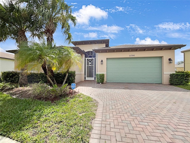 view of front of property featuring a garage