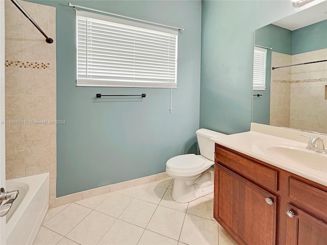 full bathroom with toilet, tiled shower / bath combo, vanity, and tile patterned flooring