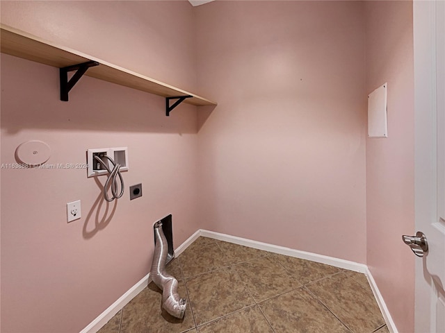 washroom with hookup for an electric dryer, washer hookup, and tile patterned flooring