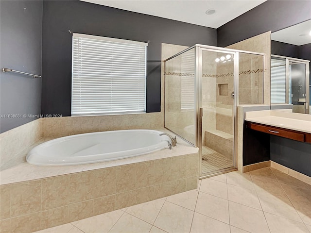 bathroom with vanity, tile patterned flooring, and independent shower and bath