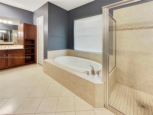 bathroom featuring vanity, separate shower and tub, and tile patterned flooring