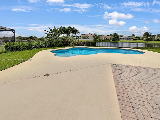 view of swimming pool with a patio area