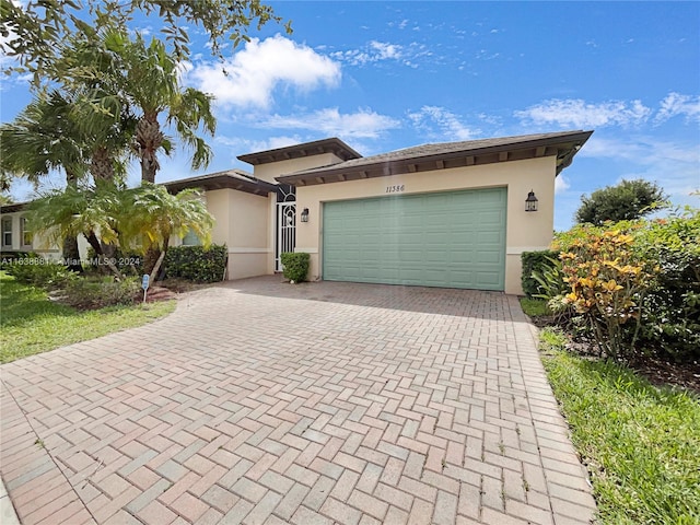 view of front of home with a garage