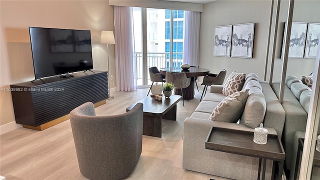 living room with light hardwood / wood-style floors