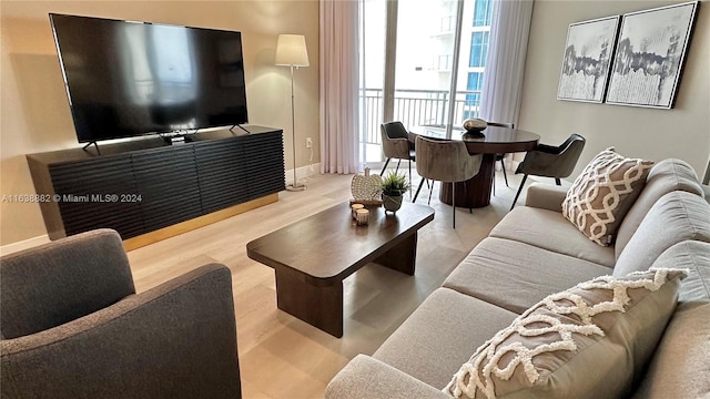 living room featuring light wood-type flooring