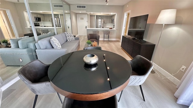 living room featuring light hardwood / wood-style floors