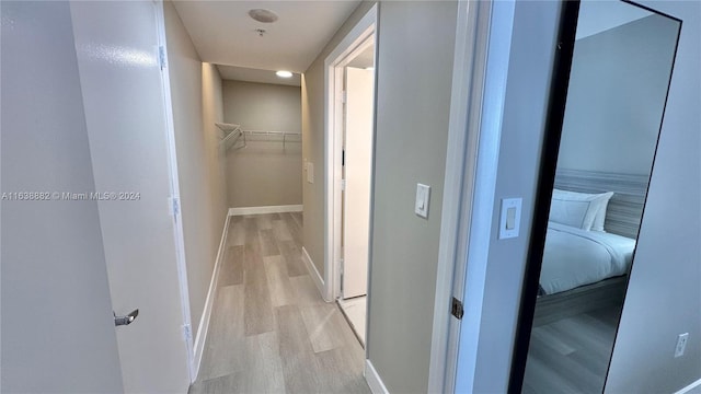 hall featuring light wood-type flooring