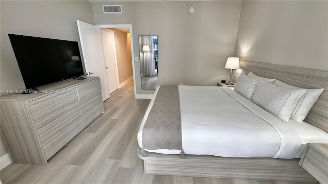 bedroom featuring light hardwood / wood-style floors