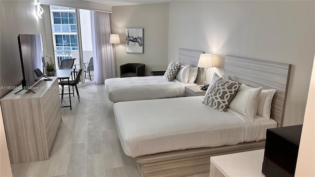 bedroom featuring light hardwood / wood-style floors