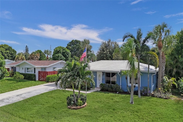 ranch-style house with a front yard