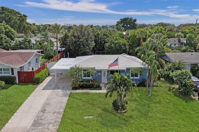 ranch-style home with a front lawn