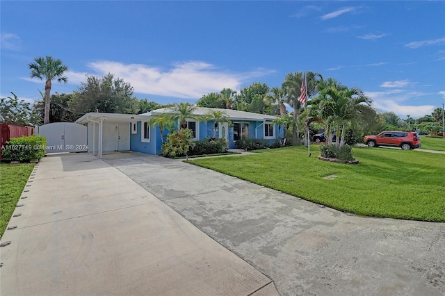 ranch-style house with a front yard