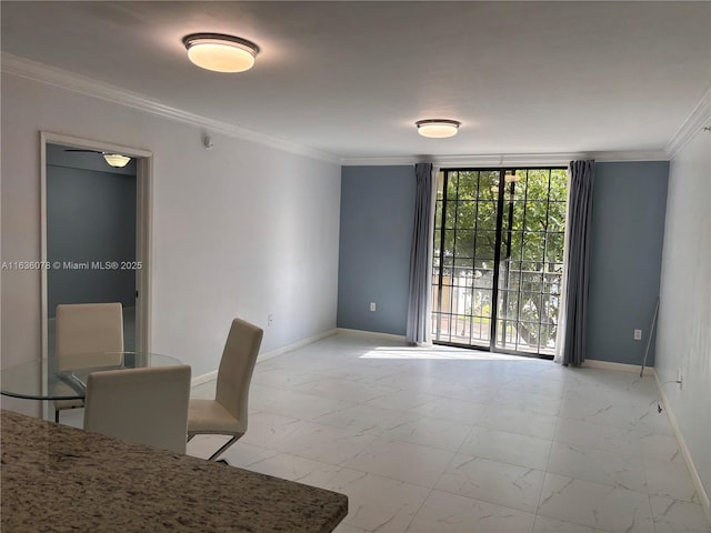 dining room with crown molding and a wall of windows