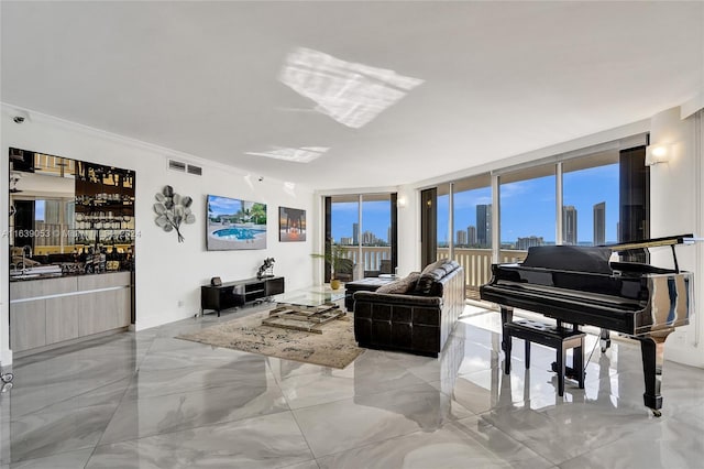 living room with crown molding, bar area, and floor to ceiling windows