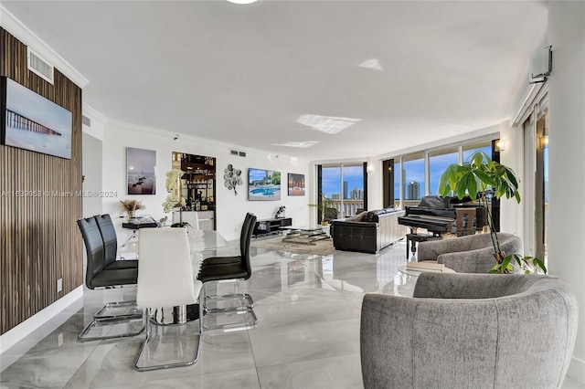 dining room featuring crown molding and floor to ceiling windows