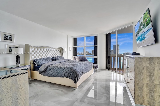 bedroom with floor to ceiling windows