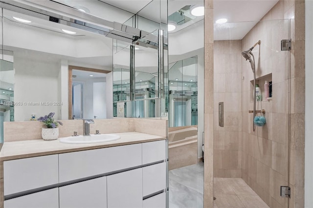 bathroom with vanity and walk in shower