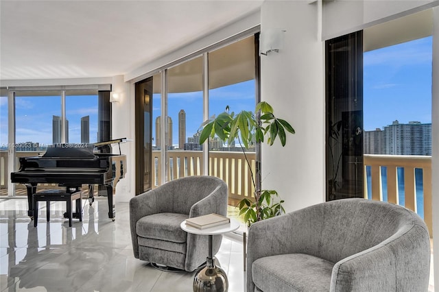 sitting room featuring expansive windows