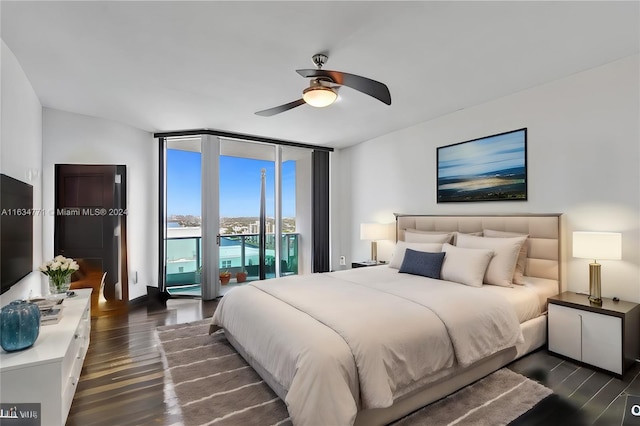 bedroom with floor to ceiling windows, dark wood-type flooring, access to exterior, and ceiling fan